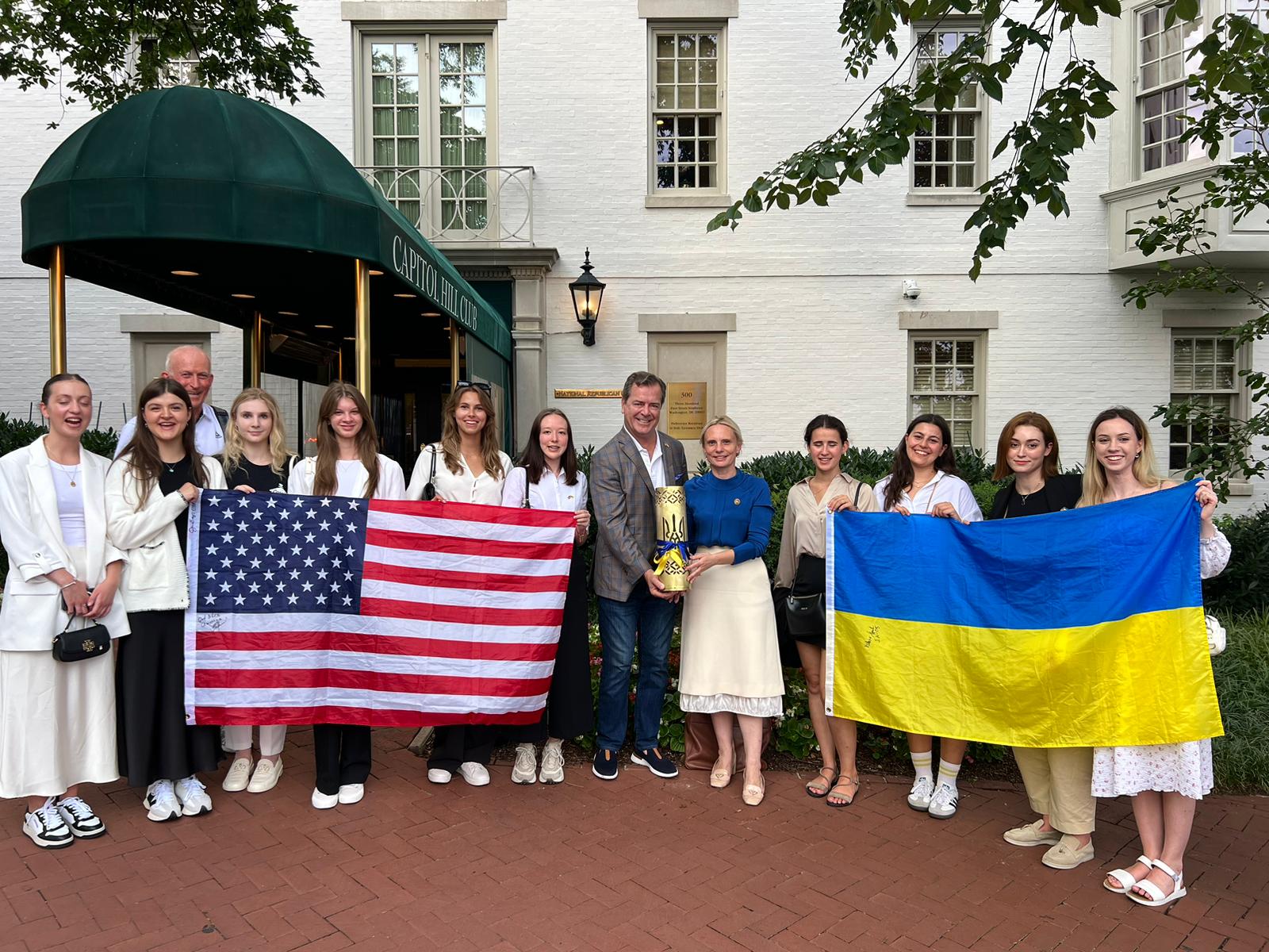 With Congresswoman Victoria Sparks, the only US Congressperson born in Ukraine. Kate and Sasha are the ones holding the American flag standing just next to Dan Rice, President of AUK.